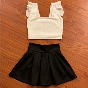 Short black pleated skirt